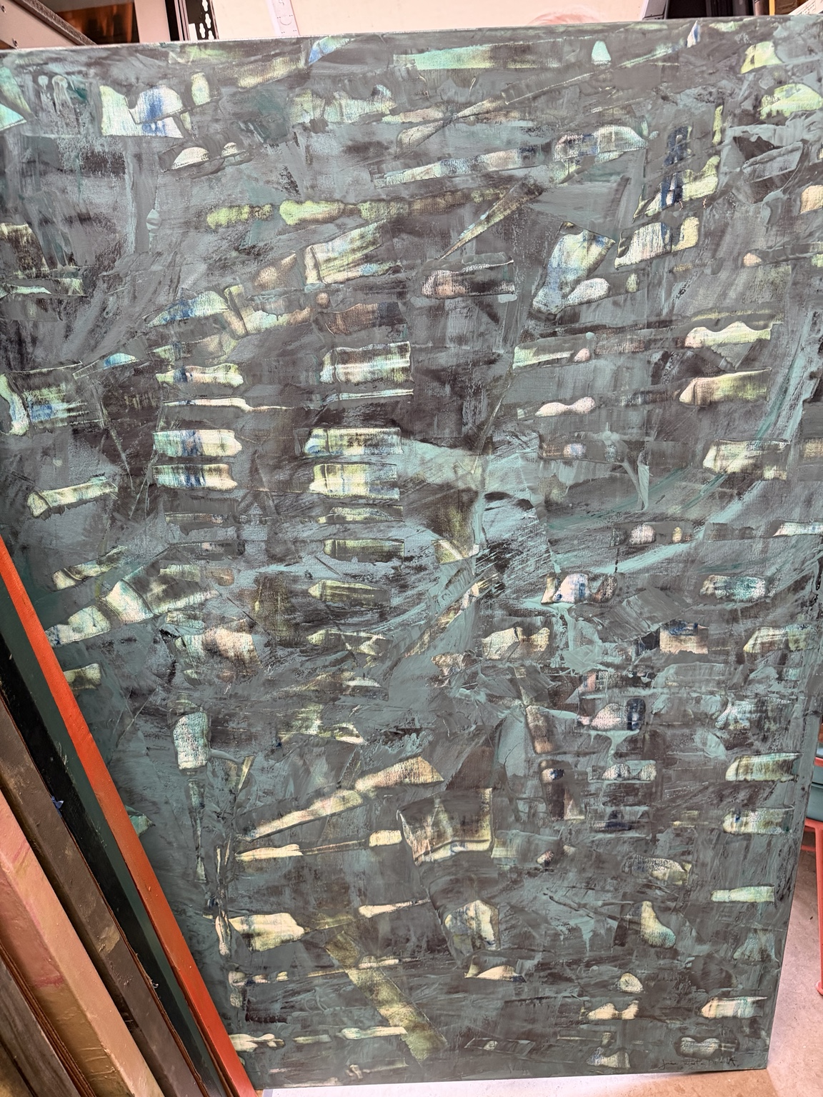 Detail of Jane Whitehurst’s abstract painting, with layered charcoal, teal, and pale gestural marks